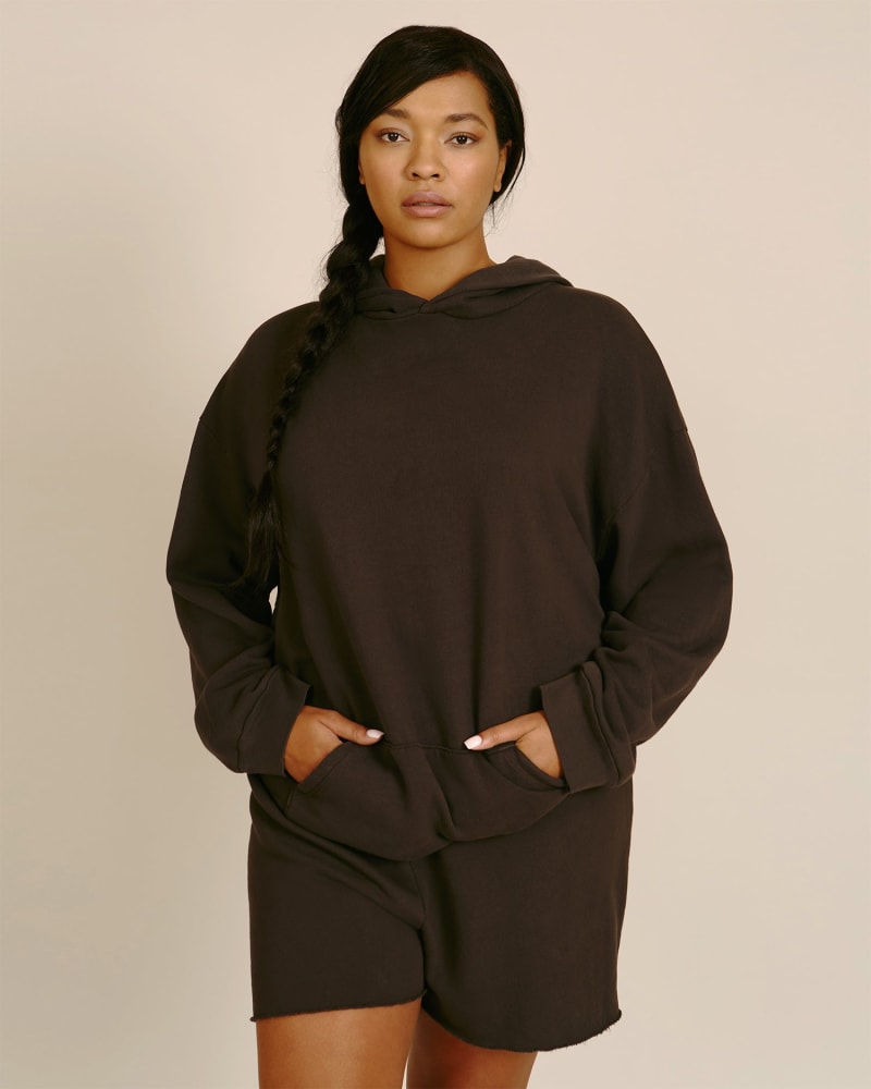 Front of a model wearing a size 1X Oversized Hoodie in Black by LNA. | dia_product_style_image_id:233267